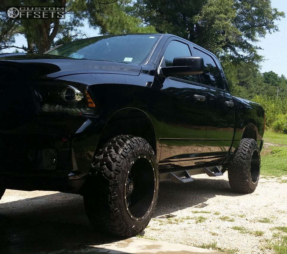 2014 Ram 1500 with 20x12 44 TIS 535B and 35/12.5R20 Nitto Trail