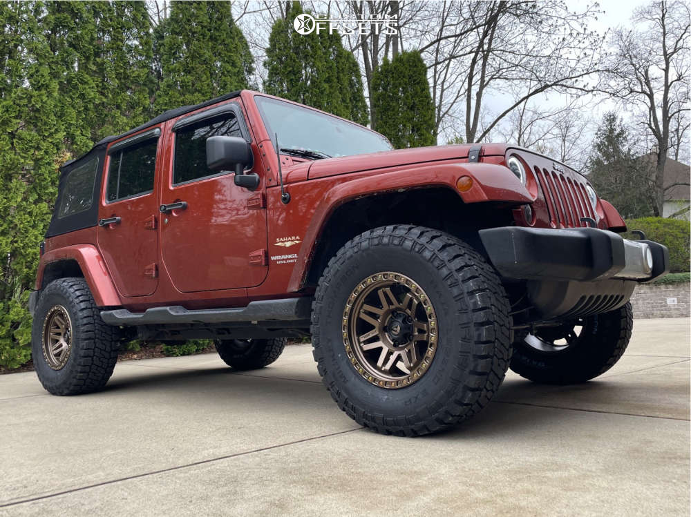 2014 Jeep Wrangler with 17x9 12 Fuel Syndicate and 35/12.5R17 Mickey Thompson Baja Legend Exp