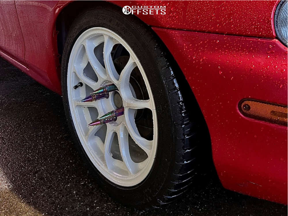 1999 Mazda Miata with 16x7 36 Volk Ze40 and 215/45R16 Michelin