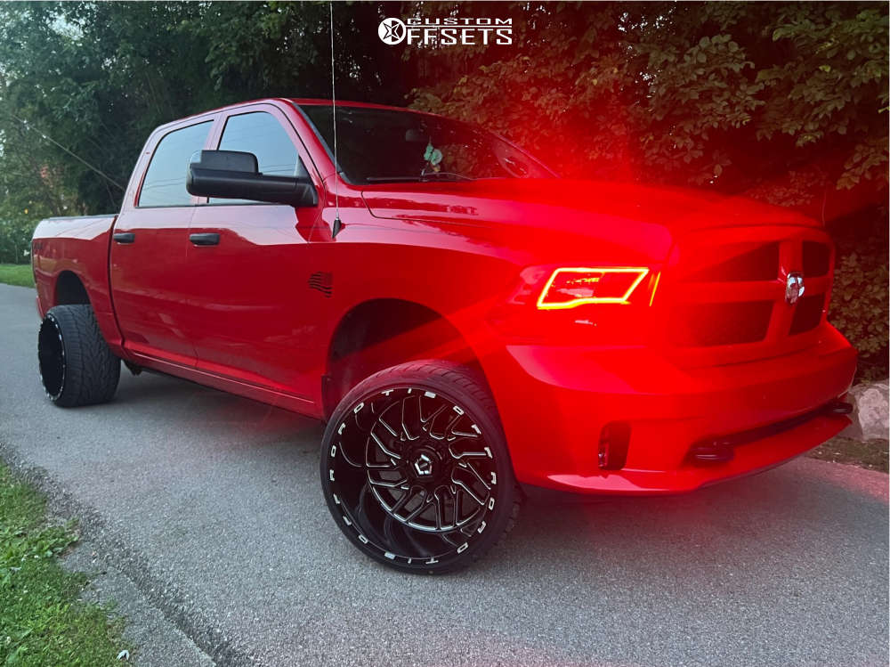 2016 Ram 1500 with 22x14 -76 TIS 544bm and 335/25R22 Toyo Tires