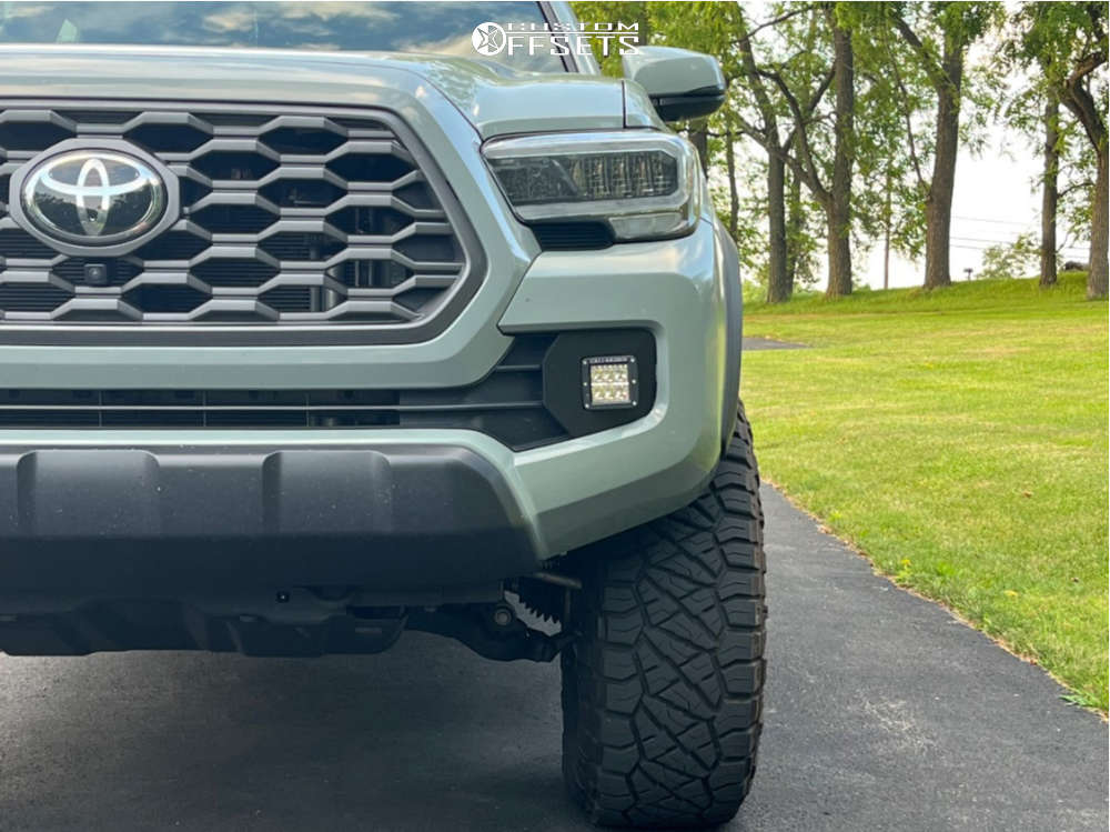 2022 Toyota Tacoma with 17x9 -12 KMC Km542 and 305/70R17 Nitto Ridge ...
