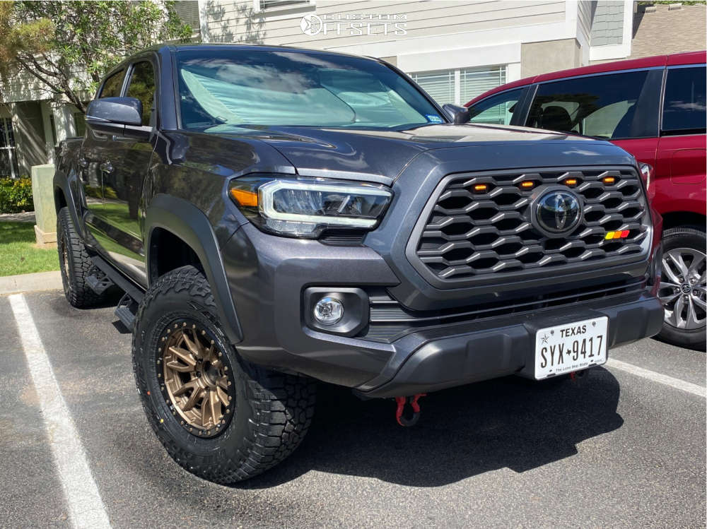 2021 Toyota Tacoma with 16x8 1 Fuel Rebel 6 and 285/75R16 Falken