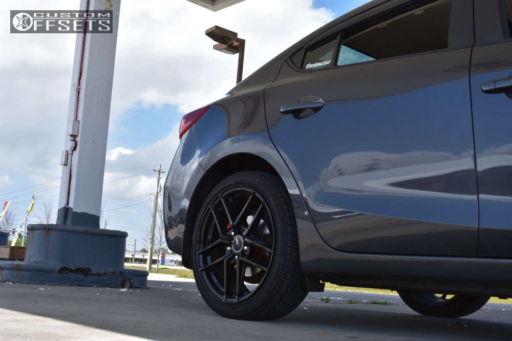 2016 Mazda 3 Sport with 18x8 40 Enkei Ty5 and 245/45R18