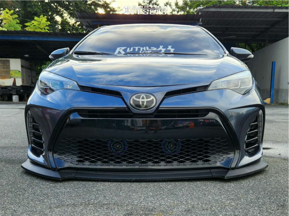 2018 Toyota Corolla with 18x9.5 38 Gram Lights 57dr and 215/35R18