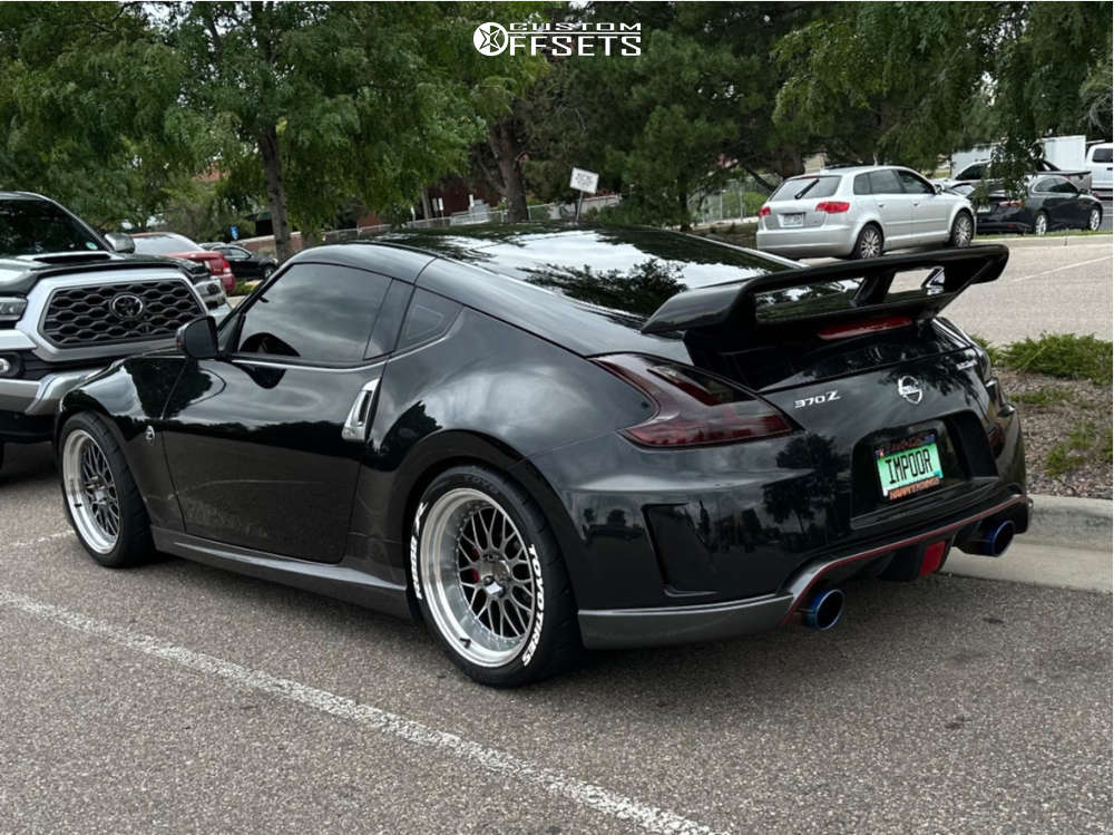 2014 Nissan 370Z with 19x9.5 22 Aodhan Ah02 and 225/65R19 Toyo