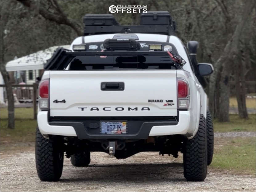 2019 Toyota Tacoma with 16x8 -12 Pro Comp 69 and 255/85R16 Falken ...