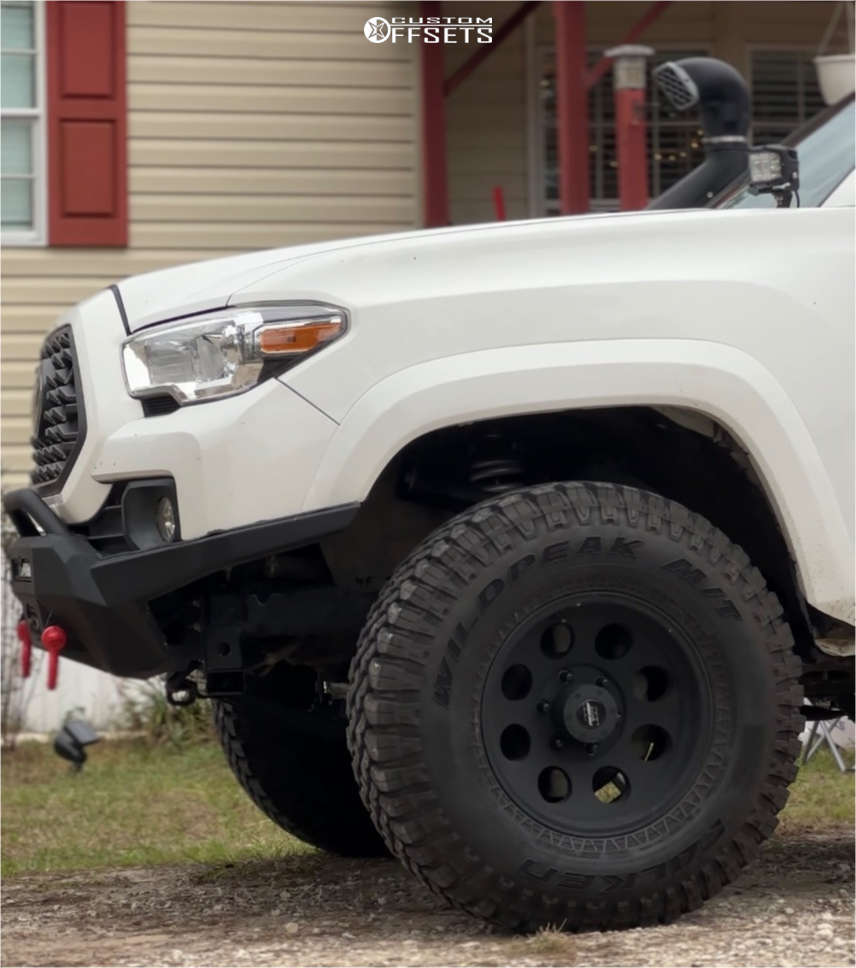 2019 Toyota Tacoma with 16x8 -12 Pro Comp 69 and 255/85R16 Falken ...