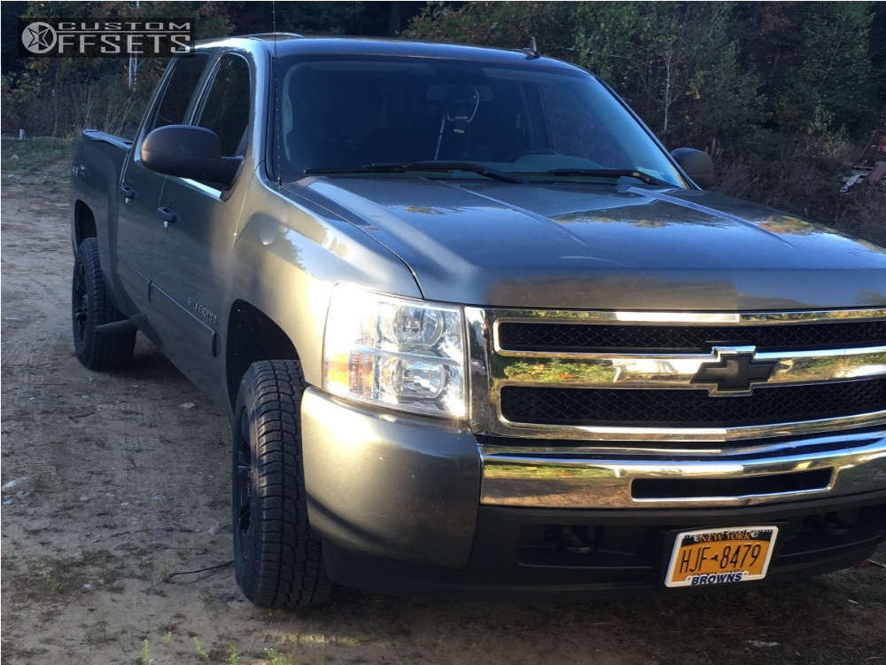 2011 Chevrolet Silverado 1500 with 17x9 6 Rebel Racing Buckshot and