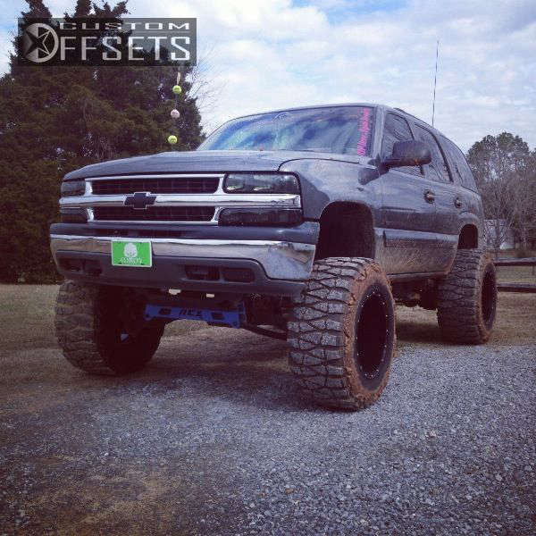 2001 Chevrolet Tahoe with 20x14 76 Fuel Hostage and 38/15.5R20 Nitto