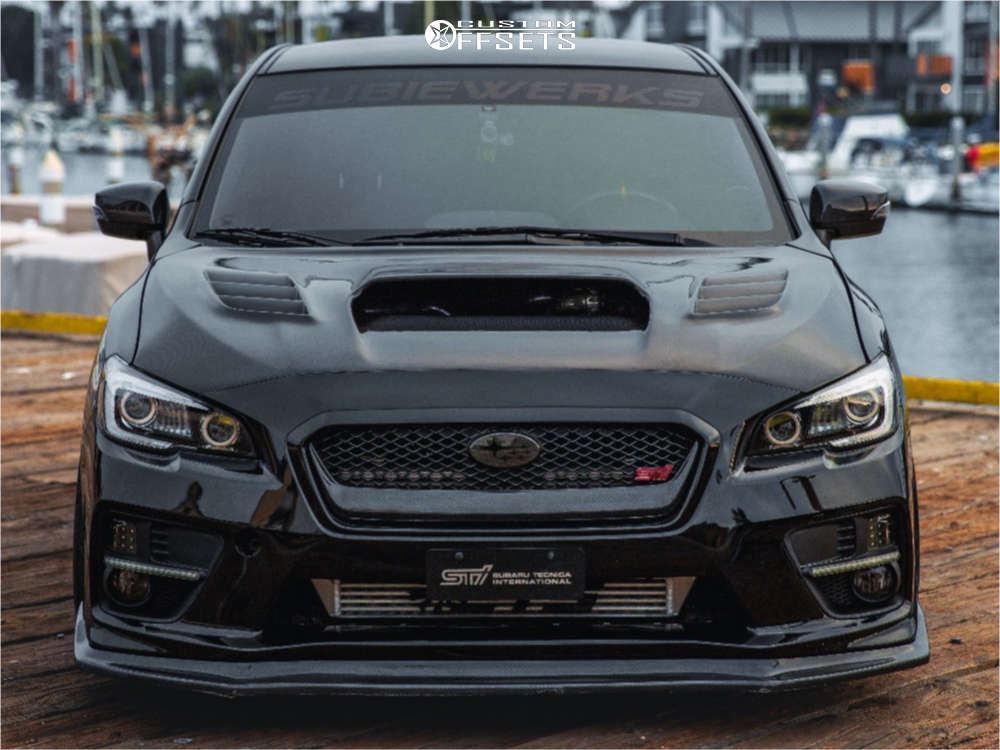 2016 Subaru WRX STI with 18x9.5 38 Enkei Ts-5 and 255/35R18
