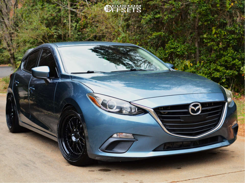 2014 Mazda 3 with 18x9.5 35 ESR Sr01 and 235/40R18 Nitto Neo Gen