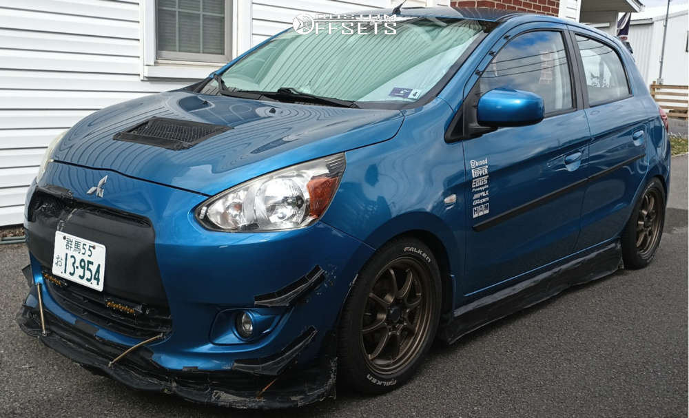 2014 Mitsubishi Mirage with 15x6.5 40 Konig Helium and 195