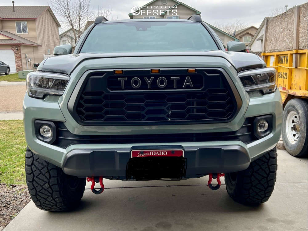 2023 Toyota Tacoma with 18x9 1 Fuel Cleaver and 285/65R18 Nitto Ridge ...