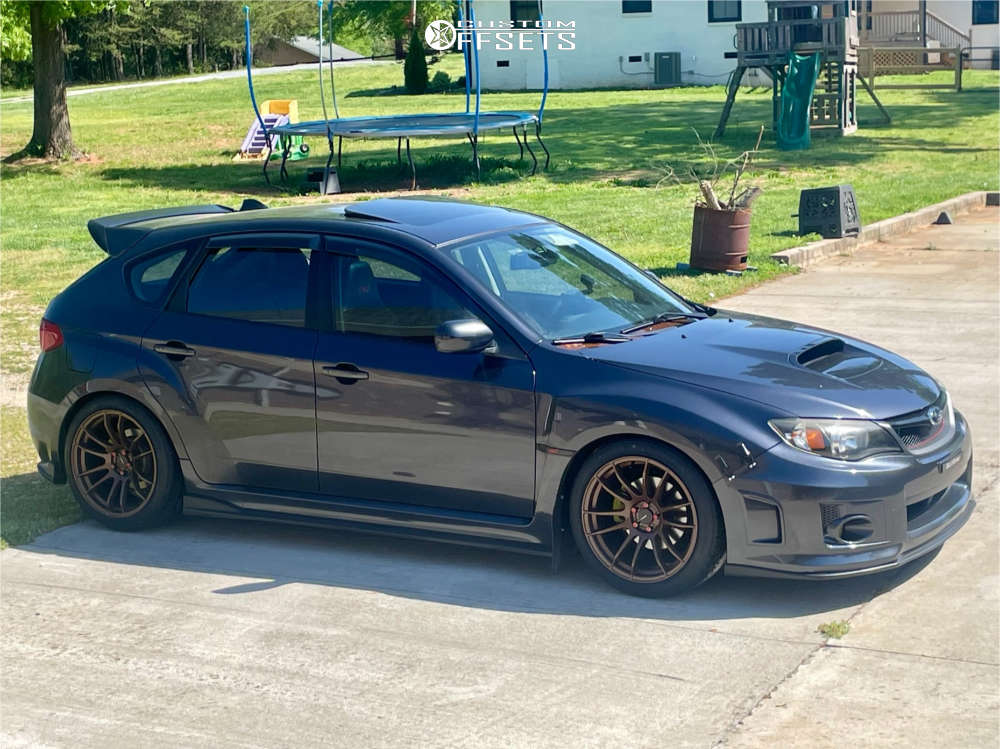 2011 Subaru Impreza with 18x9.5 38 AVID1 Av20 and 245/40R18 Nitto Neo ...
