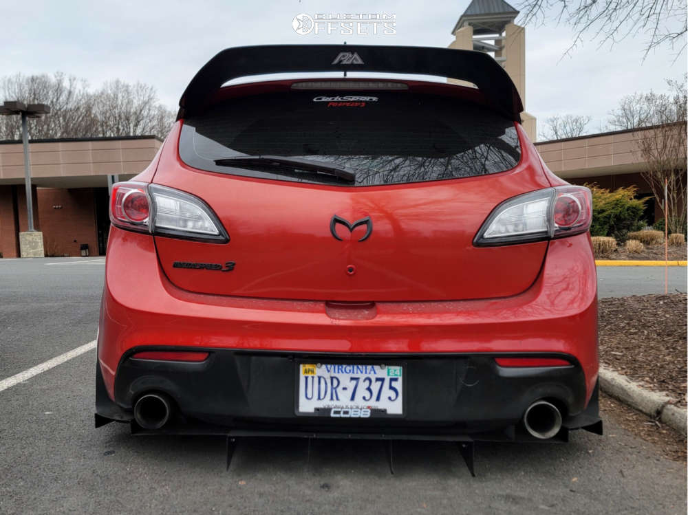2012 Mazda 3 with 17x9 5 Cosmis Racing Xt-206r and 205/40R17 Nitto