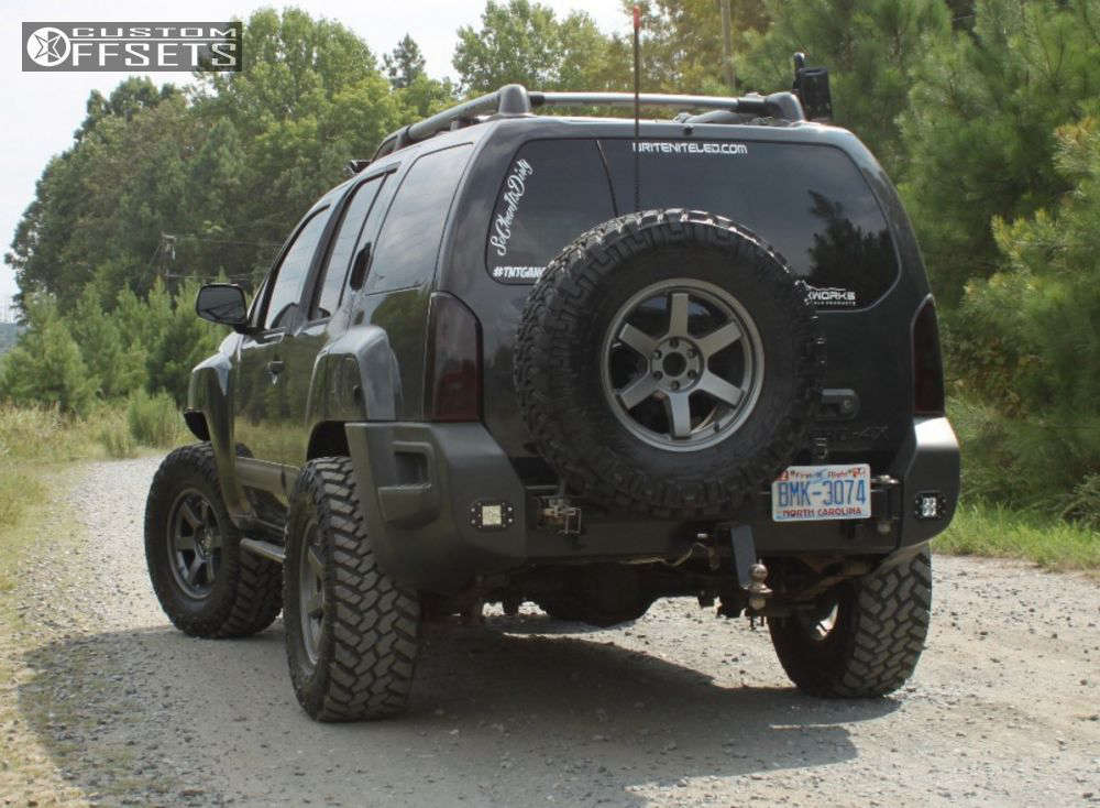 2011 Nissan Xterra with 17x8 Level 8 Mk 6 and 295/70R17 Nitto Trail