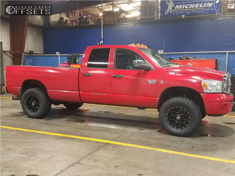 2007 Dodge Ram 2500 with 18x9 18 XD XD820 and 35/12.5R18 Nitto Ridge