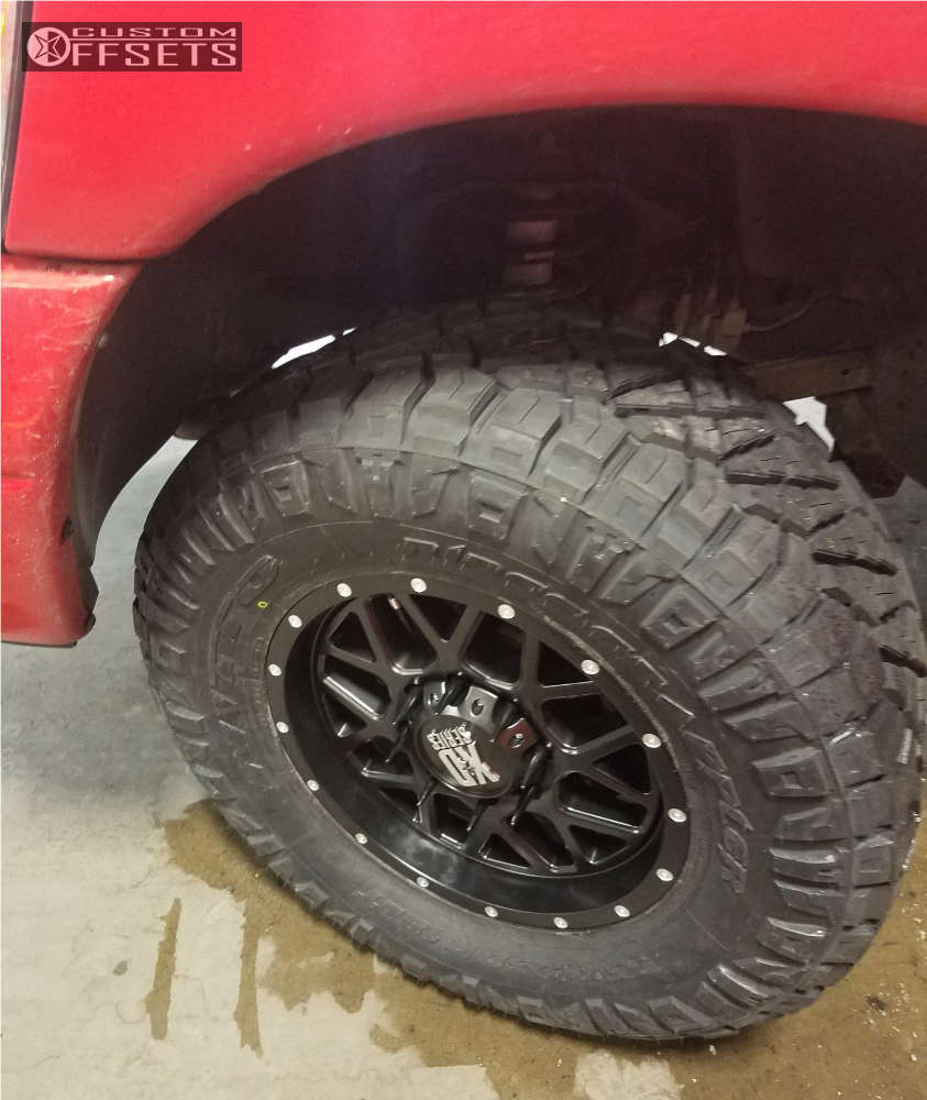 2007 Dodge Ram 2500 with 18x9 18 XD XD820 and 35/12.5R18 Nitto Ridge