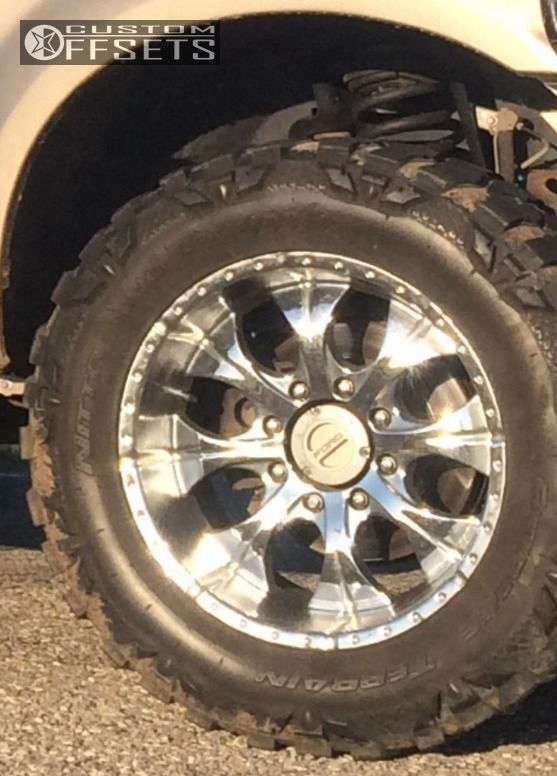 2006 Ford F-250 with 20x10 -12 Helo He791 and 35/12.5R20 Nitto Mud ...