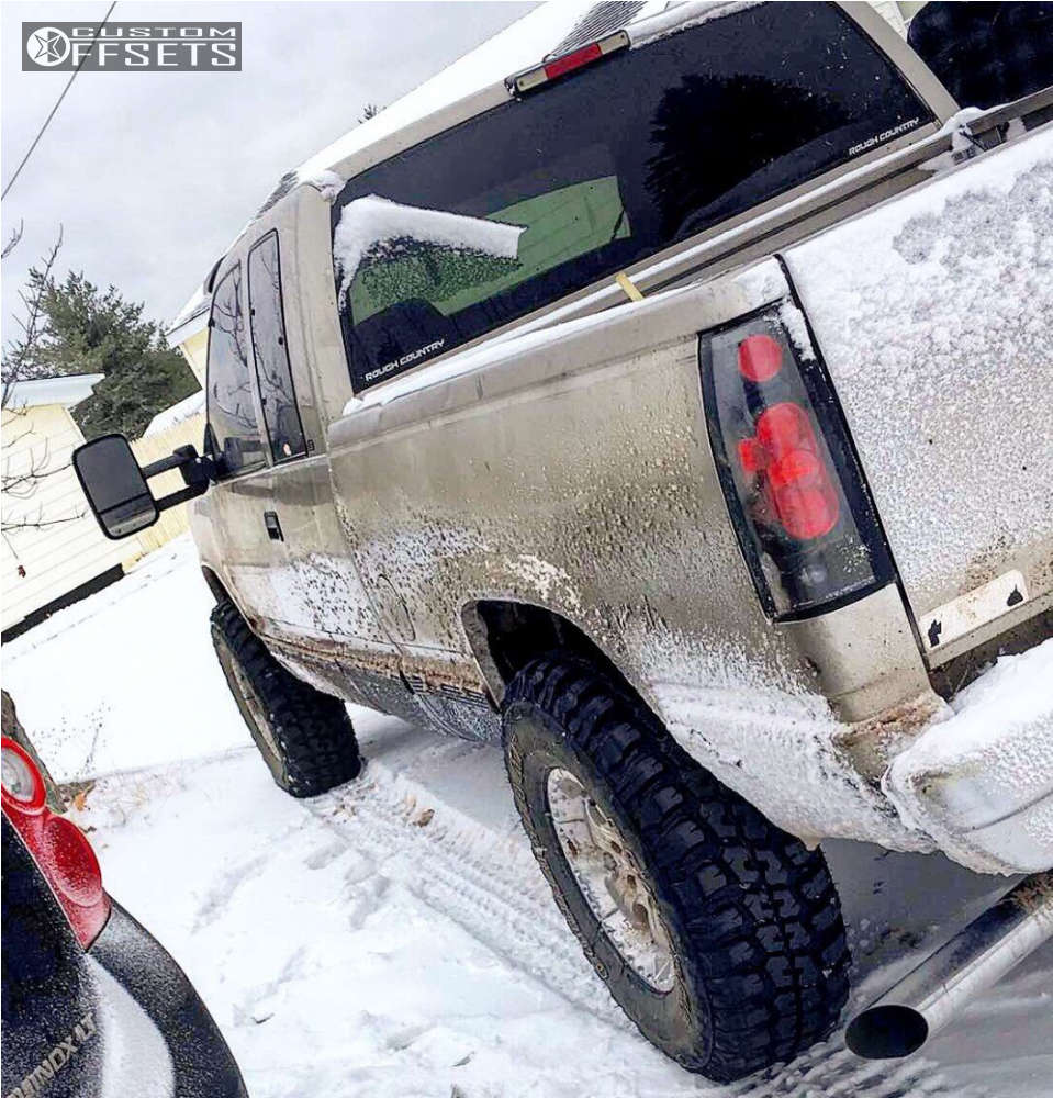 1999 Chevrolet K1500 with 16x8 0 Helo He791 and 33/10.5R16 Federal ...