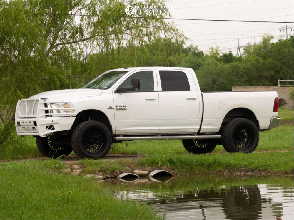 2014 Ram 2500 with 22x12 -44 TIS 553b and 35/13.5R22 Venom Power Terra ...