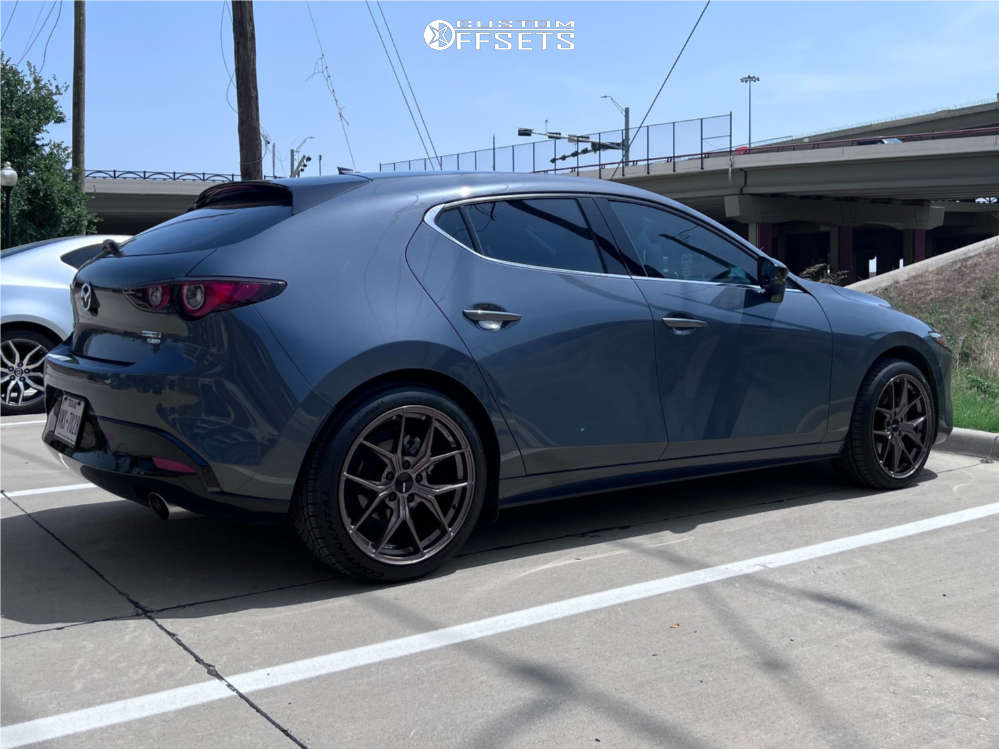 2023 Mazda 3 with 18x8.5 38 Enkei Tsr-x and 235/40R18 Continental