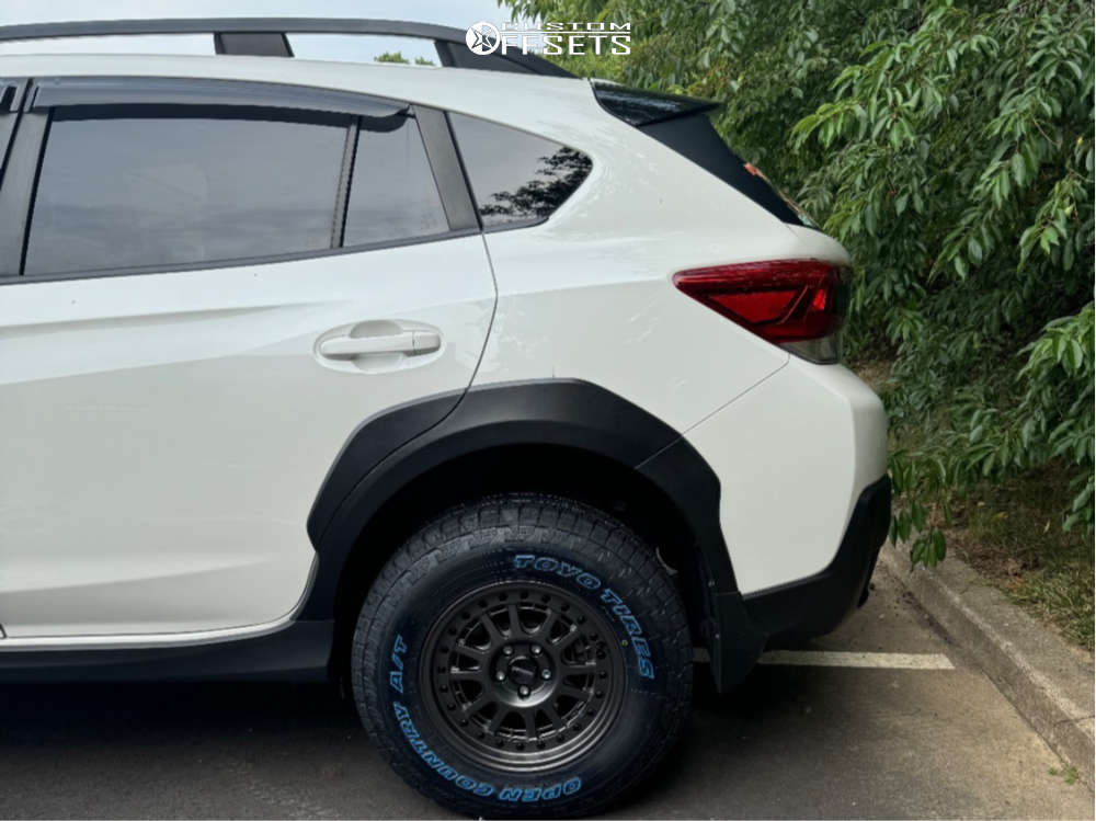 2021 Subaru Crosstrek with 15x7 15 Mayhem Compass and 215/75R15 Toyo ...