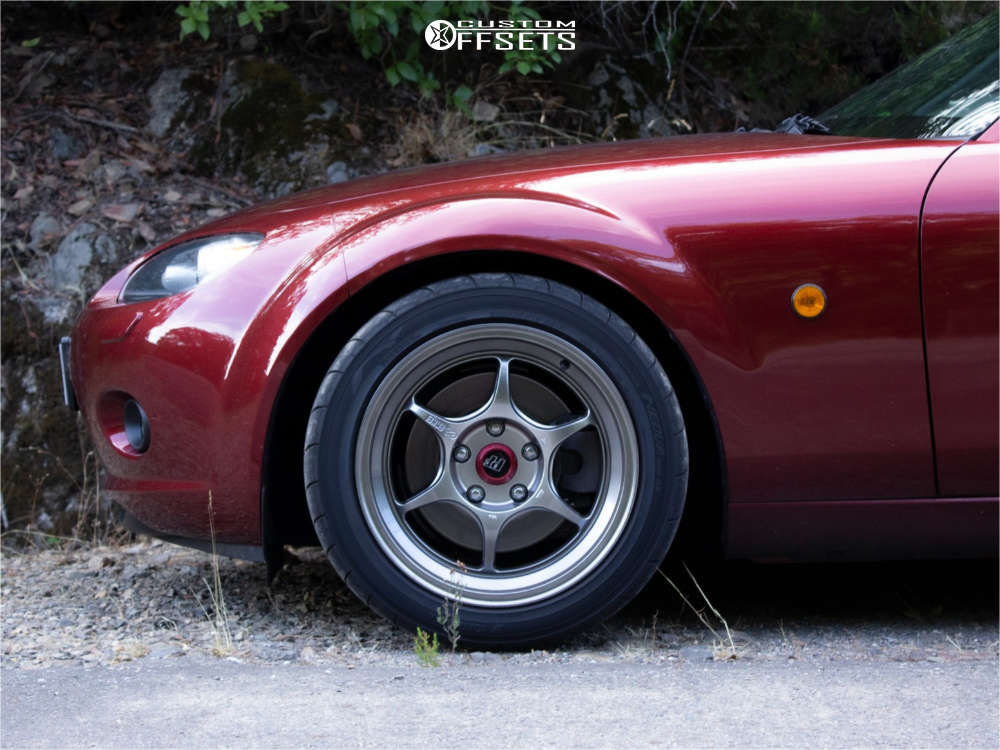 2006 Mazda MX-5 Miata with 16x8 30 Enkei Pf06 and 225/45R16