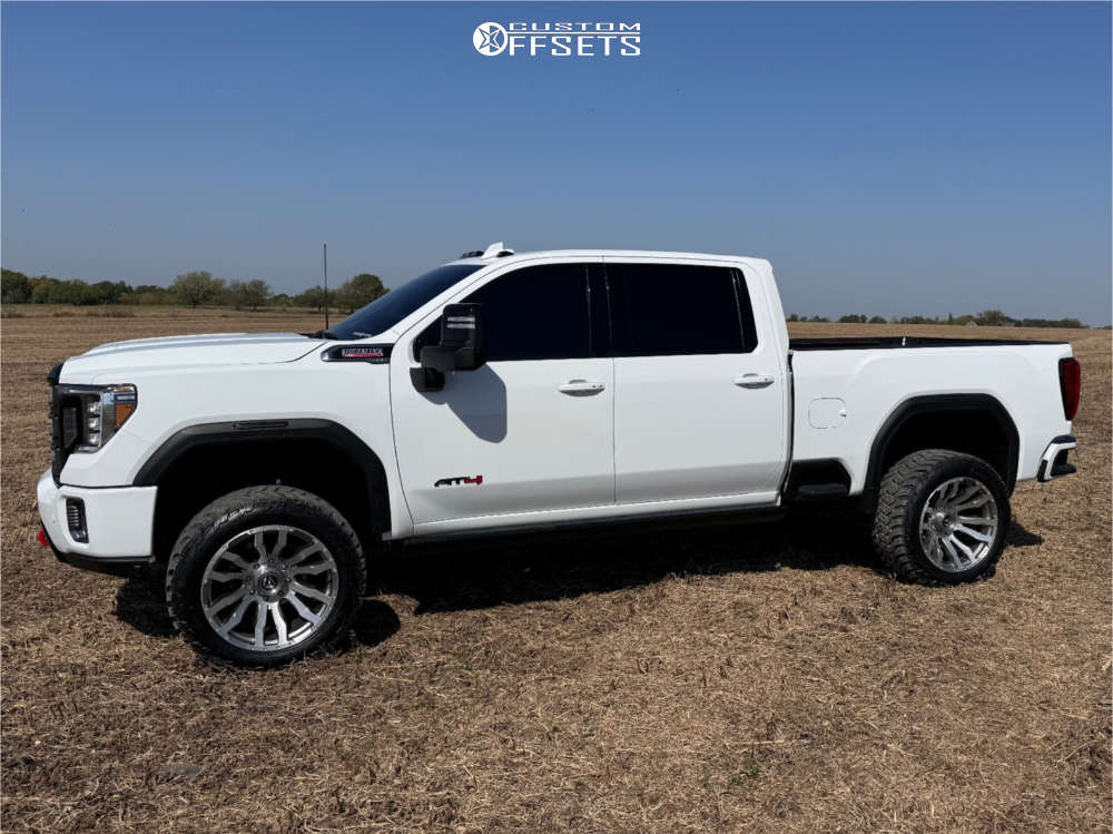 2023 GMC Sierra 2500 HD with 22x12 44 Fuel Blitz and 33/12.5R22 AMP
