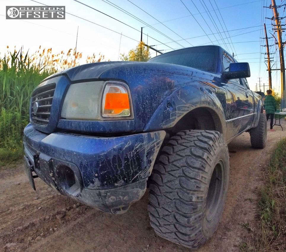 2009 Ford Ranger with 15x10 -47 Pro Comp Series 69 and 33/12.5R15 ...