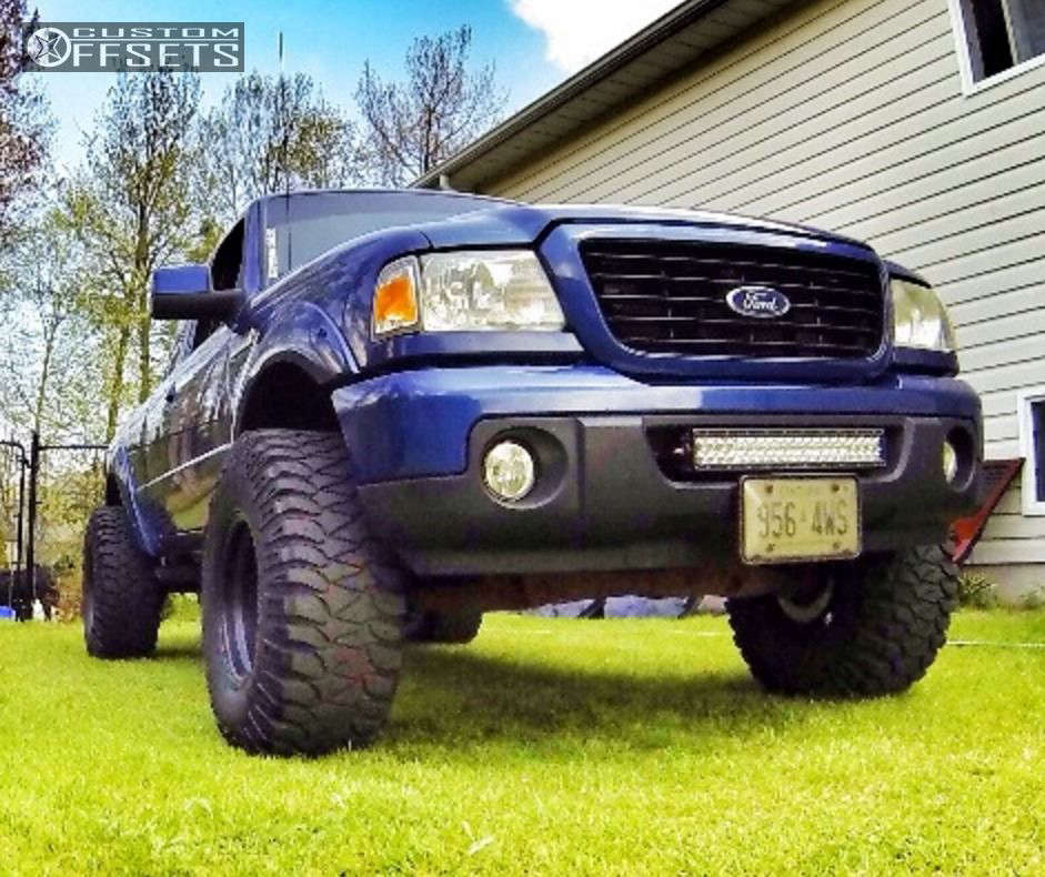 2009 Ford Ranger with 15x10 -47 Pro Comp Series 69 and 33/12.5R15 ...