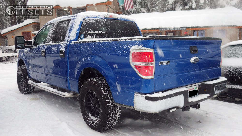 2011 Ford F150 with 17x8.5 18 Raceline Injector and 285/70R17 Toyo Tires Open Country A/T III