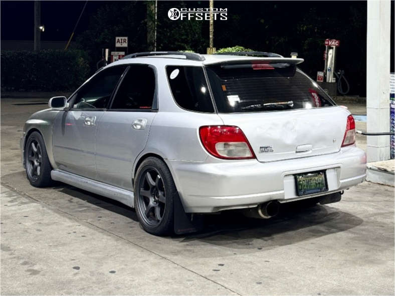 2003 Subaru Impreza with 17x9 38 Gram Lights 57dr and 245/40R17