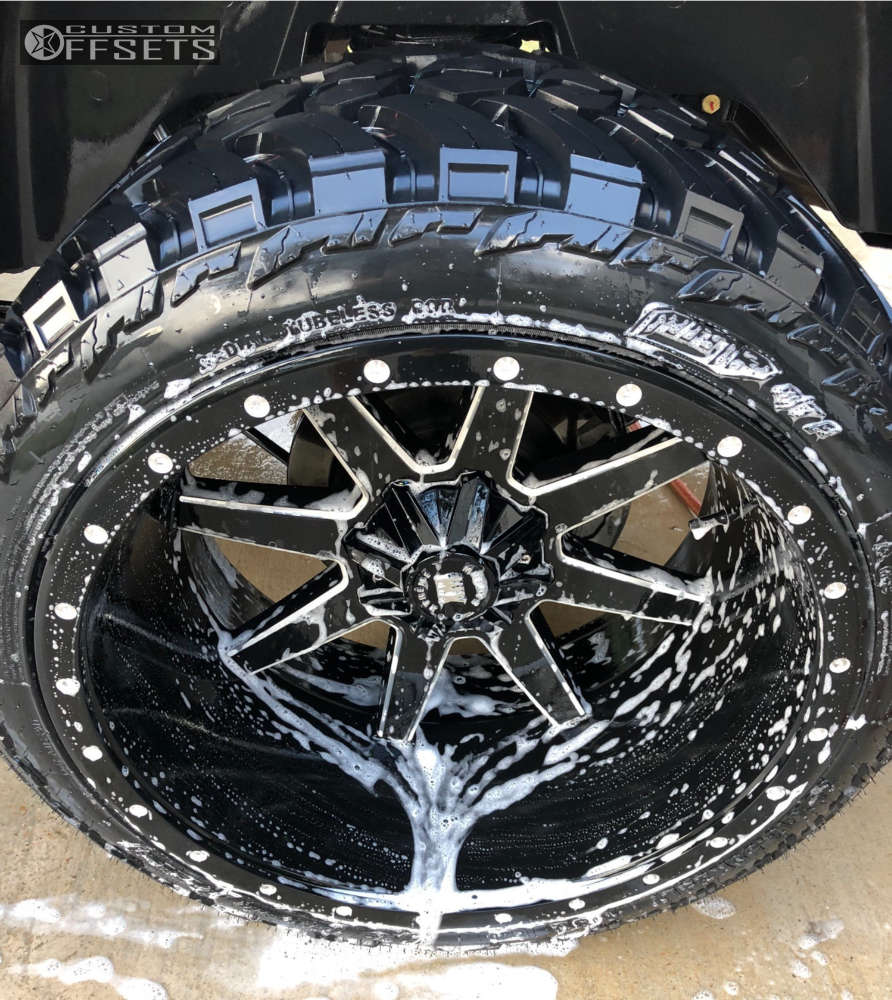 2016 Ram 1500 with 24x14 76 Xtreme Mudder Xm304 and 35/13.5R24 AMP Mud Terrain Attack MT A and