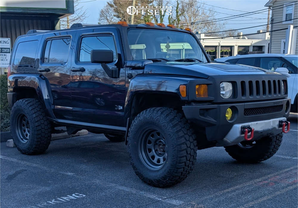 2008 Hummer H3 with 17x9 -12 Rough Country Steel Wheel and 35/12.5