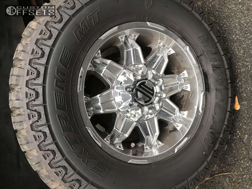 Original Excursion Rims 2000 Ford Excursion with 18x9 -12 Xtreme Nx-7 and 35/12.5R18 Mud Claw ...