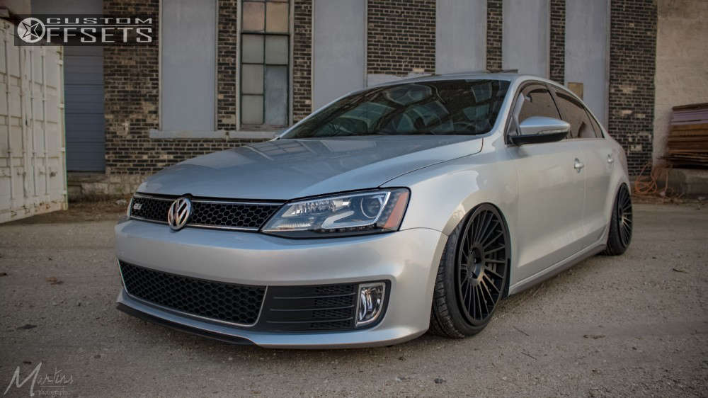 2014 Volkswagen Jetta with 18x9.5 33 Rotiform Ind-t and 215/40R18