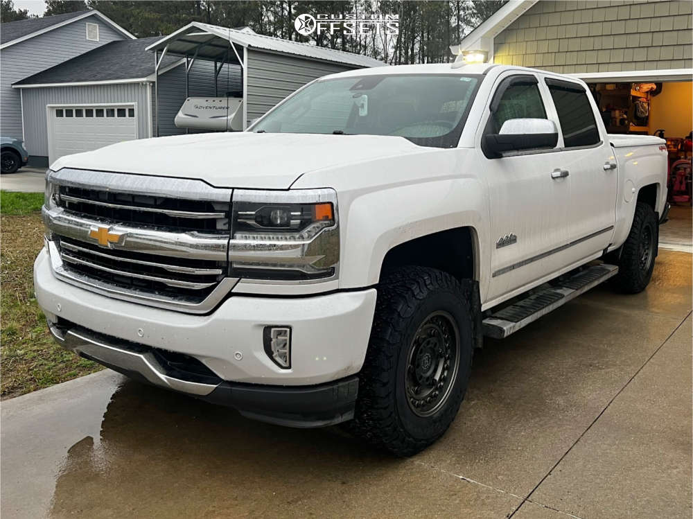 2017 Chevrolet Silverado 1500 with 17x9.5 6 Black Rhino Armory and 285 ...