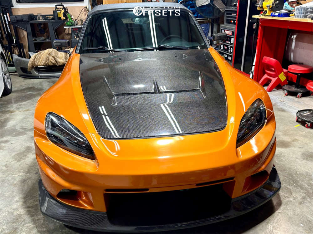 2003 Honda S2000 with 17x9 40 Enkei T6r and 215/45R17 Firestone