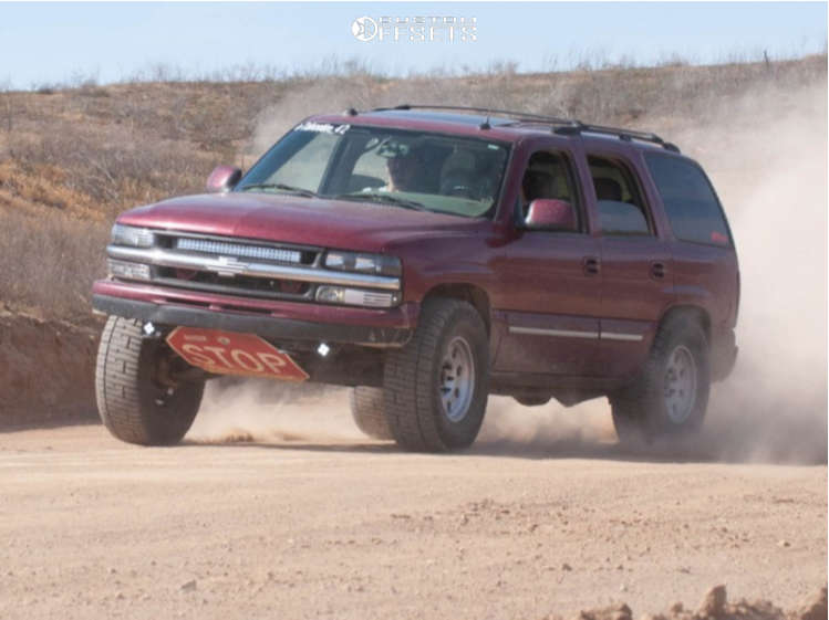 2004 Chevrolet Tahoe with 17x8 American Racing Baja and 35/12.5R17