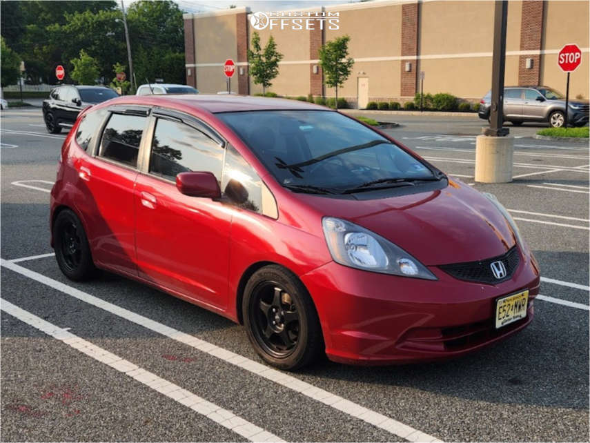 2012 Honda Fit with 15x6.5 35 AVID1 Av8 and 205/50R15 Lexani Lxtr