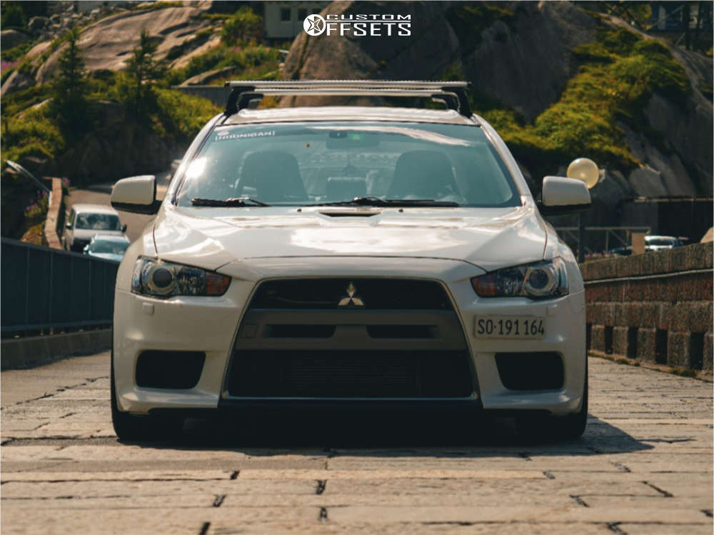2009 Mitsubishi Lancer with 18x9.5 15 Japan Racing Jr7 and 245