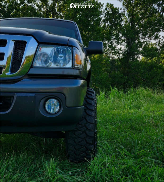 2011 Ford Ranger with 15x10 -47 Pro Comp Series 69 and 31/10.5R15 ...