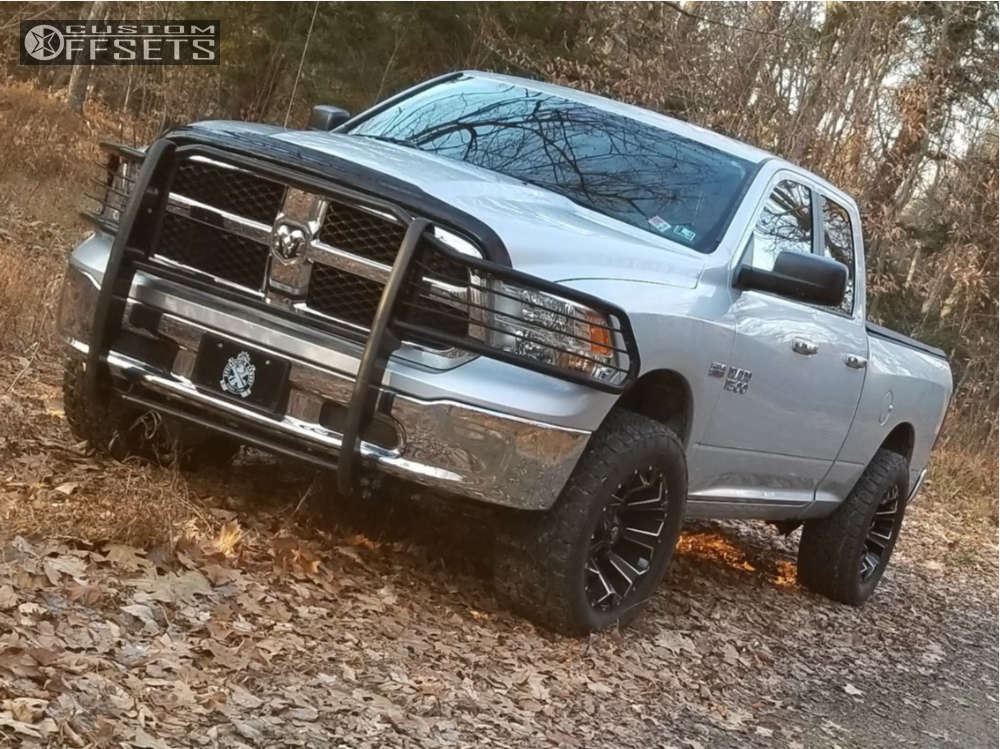 2014 Ram 1500 with 20x10 18 Fuel Assault and 305/55R20 Nitto Terra