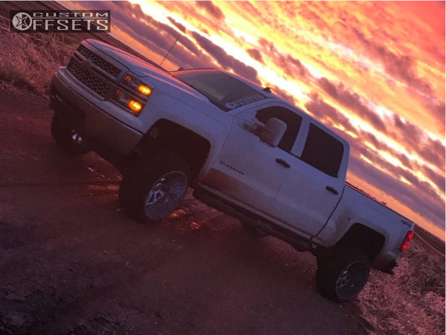 2014 Chevrolet Silverado 1500 with 22x14 76 American Truxx Striker and