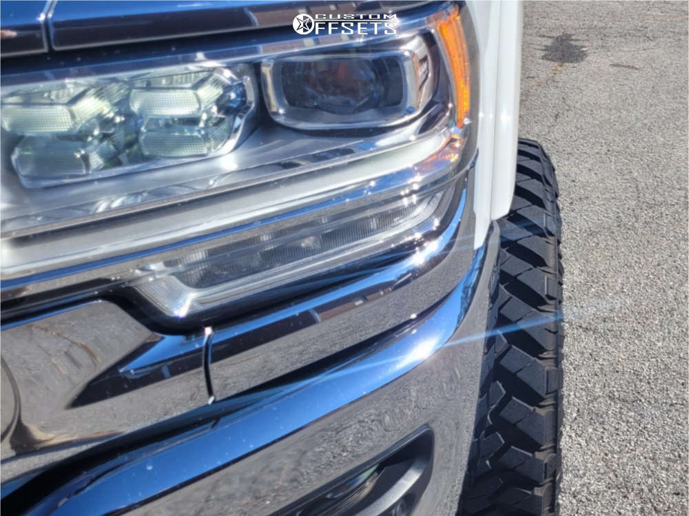 2022 Ram 2500 with 20x10 -18 Method MR803 and 35/12.5R20 Nitto Trail ...