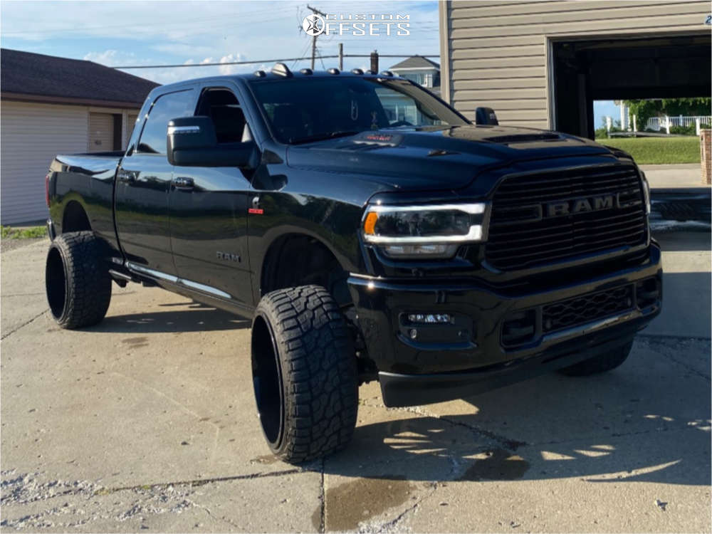 2024 Ram 2500 with 24x14 -76 TIS 547b and 305/35R24 RBP Repulsor Rt and ...