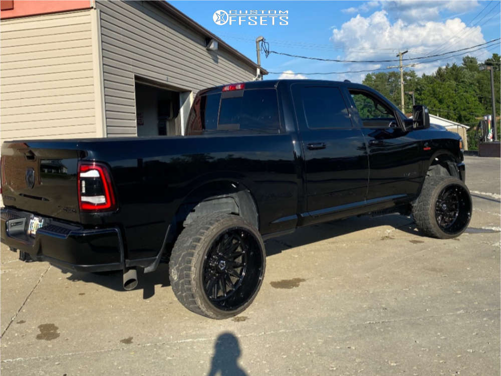 2024 Ram 2500 with 24x14 -76 TIS 547b and 305/35R24 RBP Repulsor Rt and ...