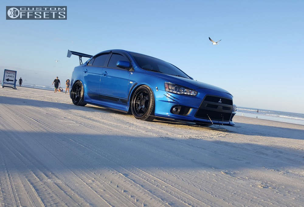 2012 Mitsubishi Lancer with 18x9.5 28 Aodhan Ah01 and 215/40R18