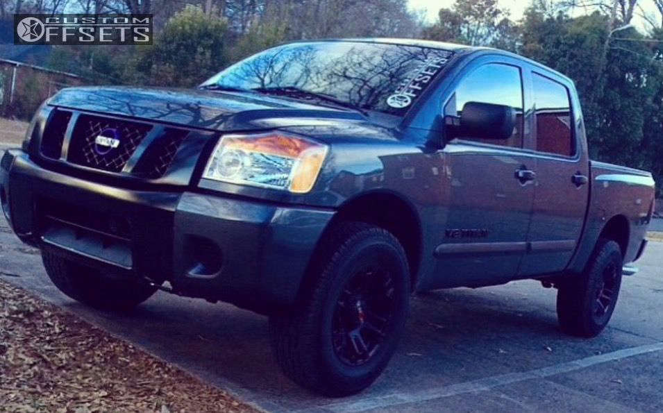 2008 Nissan Titan with 18x9 12 Work Beast Ii and 33/12.5R18 Wild